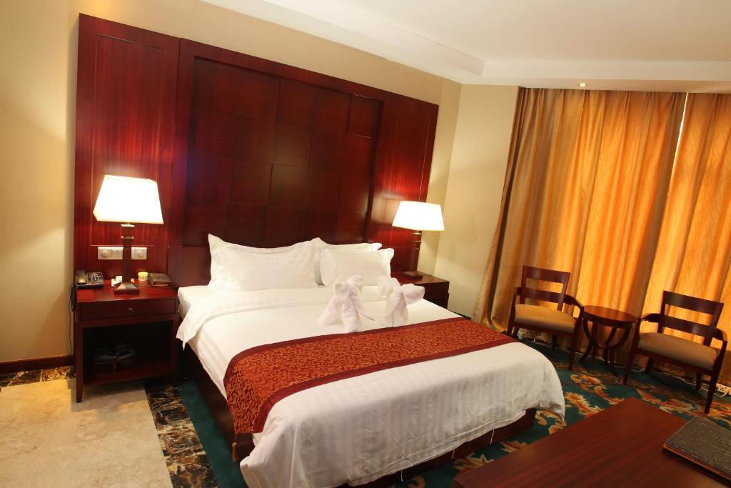 Hawaii Hotel Sanya Quarto foto