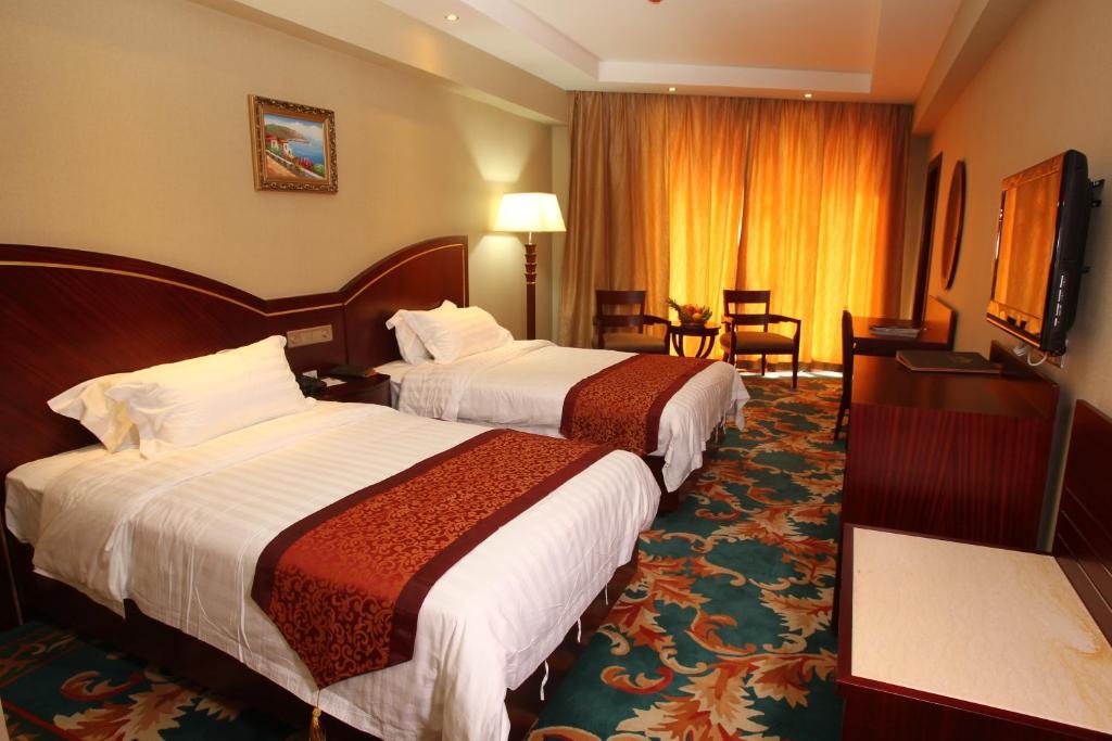 Hawaii Hotel Sanya Quarto foto